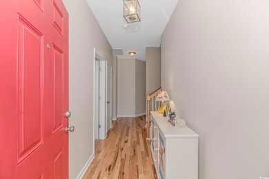 Corridor featuring light hardwood / wood-style flo