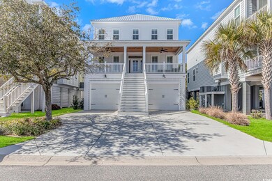 Coastal inspired home featuring a porch, metal roo