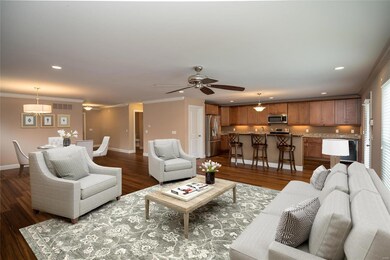You will love the open floor plan and gleaming hardwood floors!