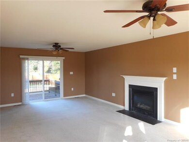 Very large Living room  has fireplace and glassed 