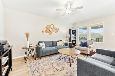 Living area featuring light wood-type flooring, a