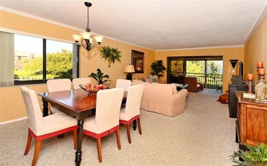 Living/Dining room with sliders to Florida room