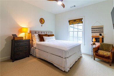 Bedroom featuring carpet floors and ceiling fan