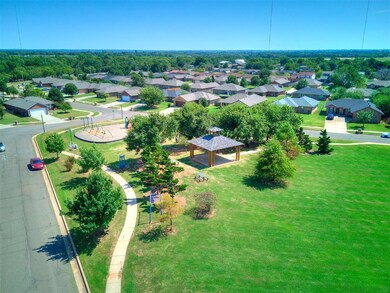 Aerial perspective of suburban area featuring a recreational park