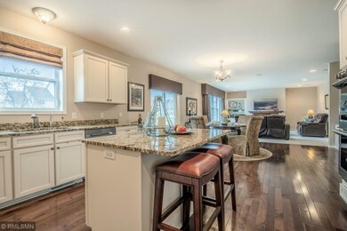 Center island, walk-in pantry, granite counters, a