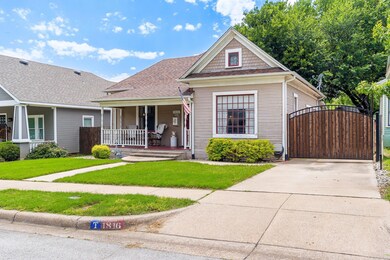 View of front of property featuring covered porch 