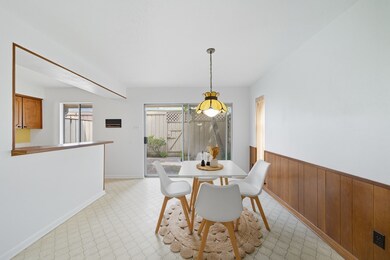 Dining/kitchen combo with access to the private patio