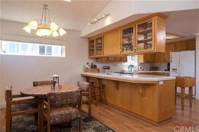 The kitchen is open to the dining area.  Kitchen b