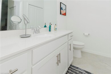 Bathroom featuring vanity and tile patterned floors