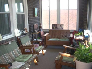 Sunroom. Enclosed front porch-Use it all year