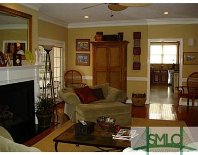 Living Room. Great room has two sets of double Fre