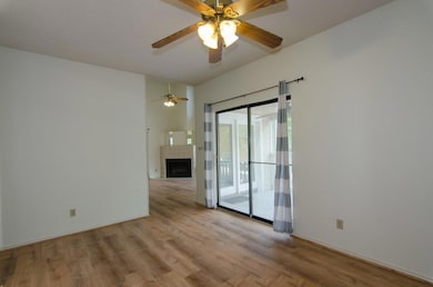 Unfurnished room with wood finished floors, a cei