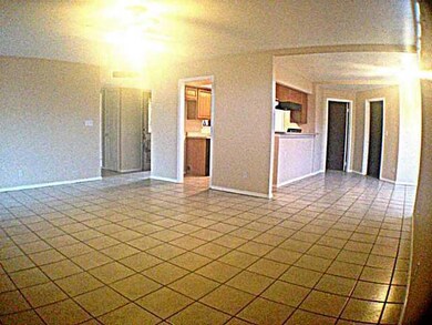 Living room with view to the kitchen are