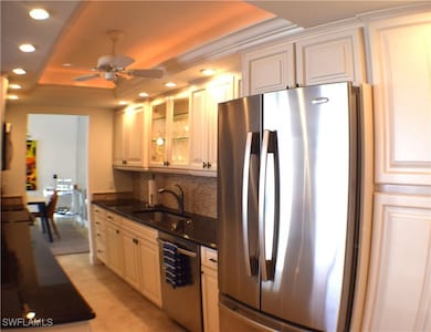 Kitchen with stainless steel appliances recessed l