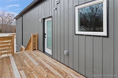 Deck located off residence main entrance