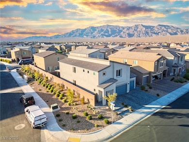 Aerial view at dusk of a residential view and a mountain view
