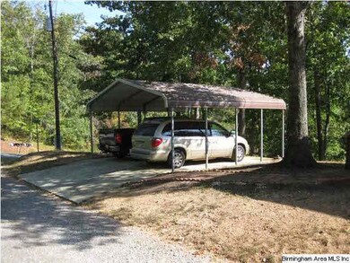 DETACHED 2 CAR CARPORT W/CONCRETE PARKING PAD