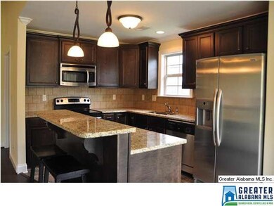 Gorgeous eat-in Kitchen with island and stainless 