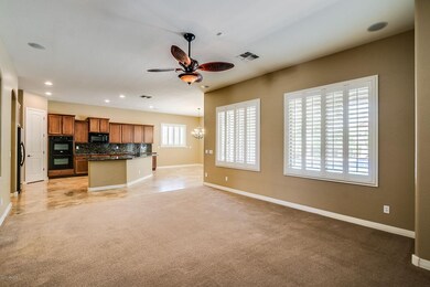 OPEN FAMILY ROOM VIEW OF KITCHEN