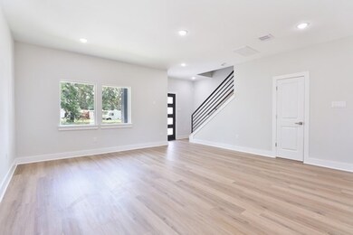 This door opens to a convenient powder room.