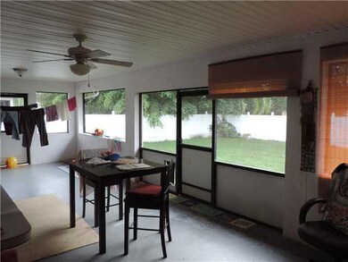 Kitchen. offers pass thru window to patio