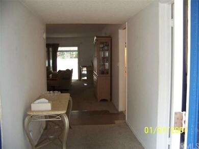 Entryway with extra large hall way.