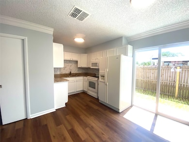Dining Area to Kitchen