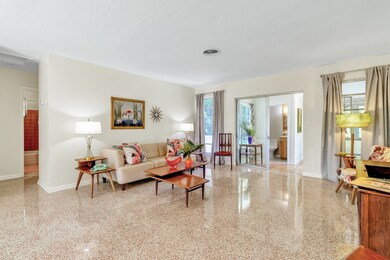 Living Room with GLEAMING POLISHED TERRAZO FLOOR.
