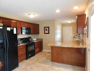 Kitchen provide spacious countertops.