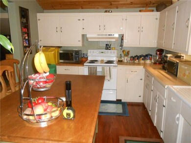 Updated kitchen with a wood floor