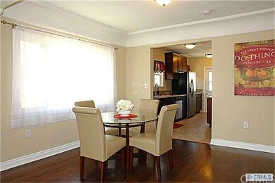 Light & Bright Formal Dining w/ hardwood floors an