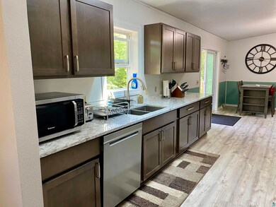Kitchen featuring appliances with stainless steel 