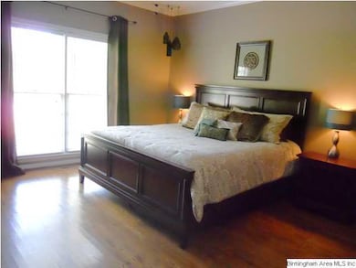 Main Level Master Bedroom w/hardwood floors....