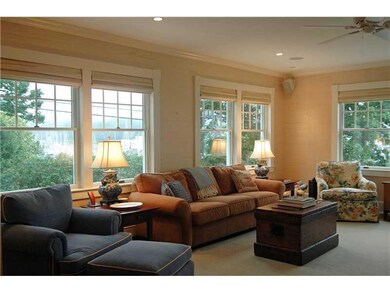 Living Room. Views of the harbor can...