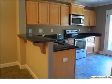 Breakfast Bar between Dining area and Kitchen