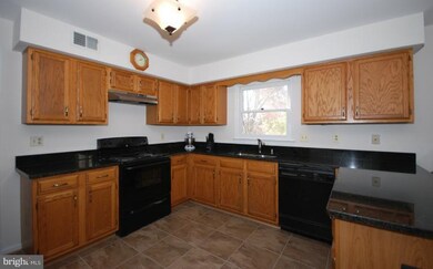 5 Peach Leaf Ct, North Potomac, MD 20878 - photo 2