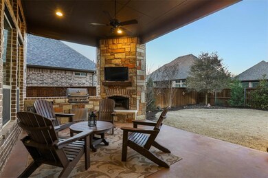 Enjoy the outdoors in the lush backyard boasting a