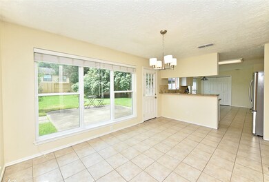 Enjoy backyard views from the kitchen and dining r