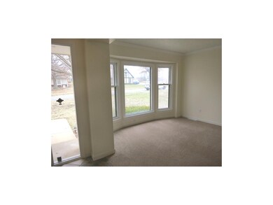 Enter into the formal living room with beautiful b