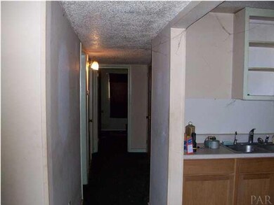 VIEW FROM GREAT ROOM DOWN HALL TOWARDS MASTER BEDROOM.