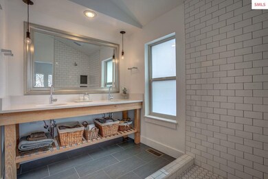 Master vanity with Silestone quartz & rustic open 