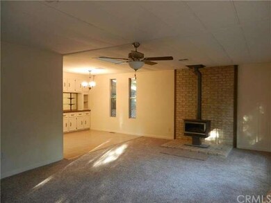 Attractive brick hearth & woodstove
