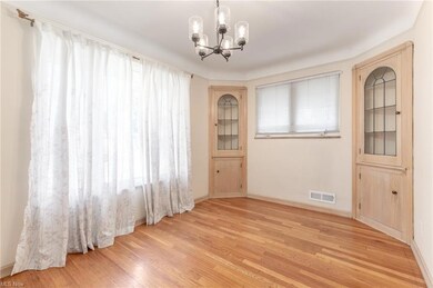 Beautiful hardwood floor and built-in cabinets