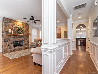 Craftsman style molding and arches that make this 