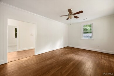 The spacious living room also features an open con