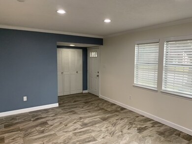 Entertain your guests in the comfortable living ro
