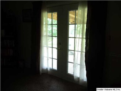 French doors going out to the covered deck.