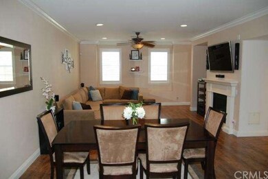 Sizeable great room with distressed floor, mantled