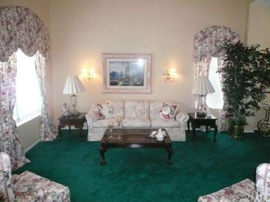 Big bright formal living room.