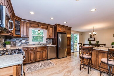 New kitchen with Amish built cabinets with toe kic